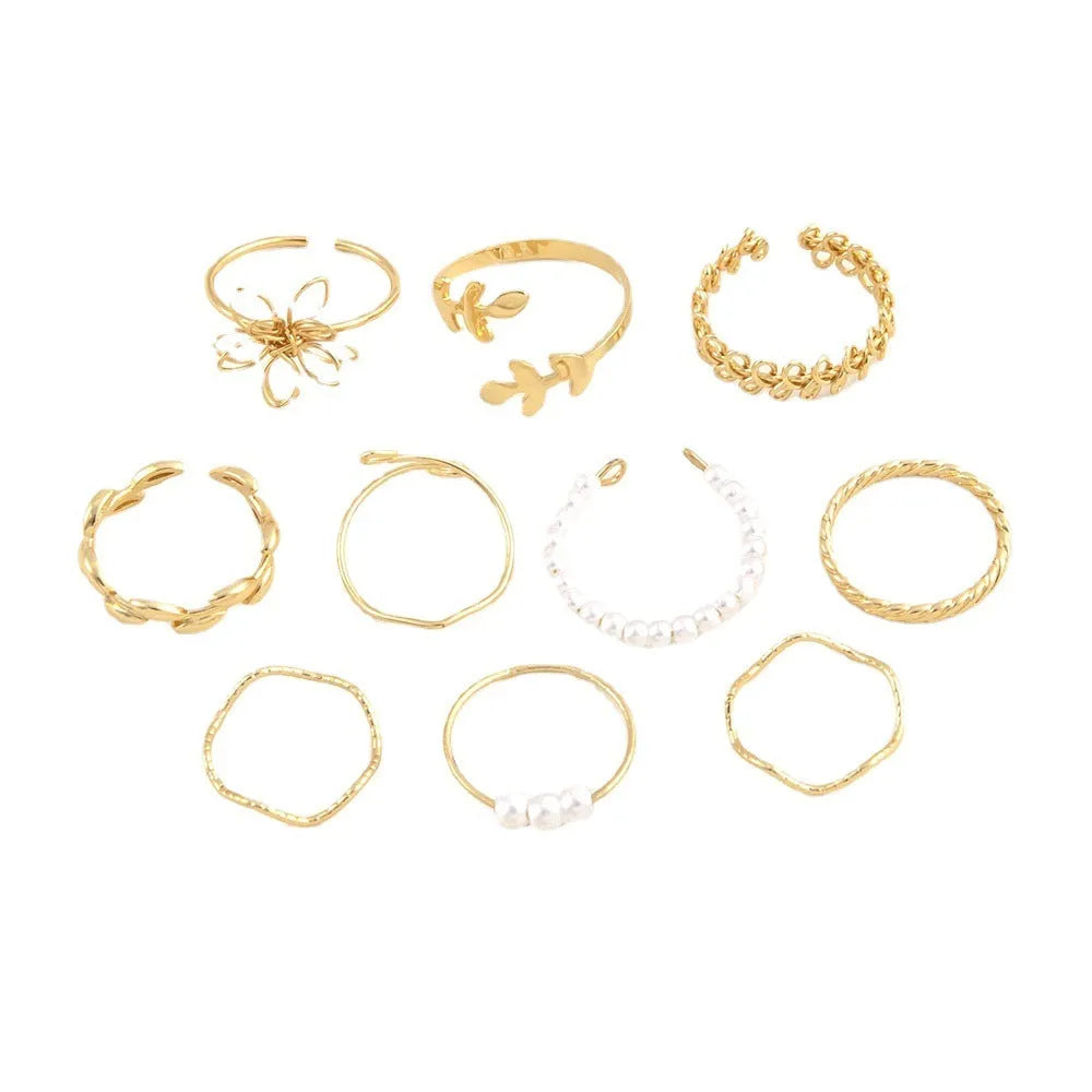 Gold openwork floral pattern alloy ring with electroplated glossy finish