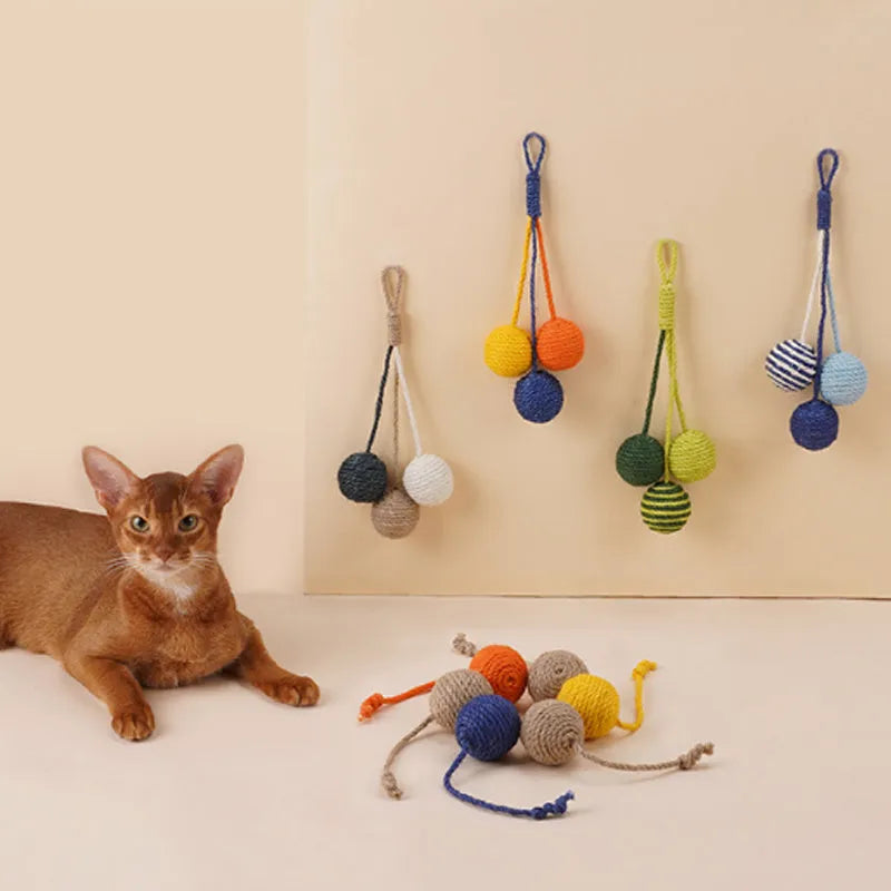 Cat teaser wand with catnip ball and feather toys in multiple colours including blue, green, red, yellow