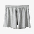 Men's high-waist loose fit cotton boxer shorts in black, shown flat.