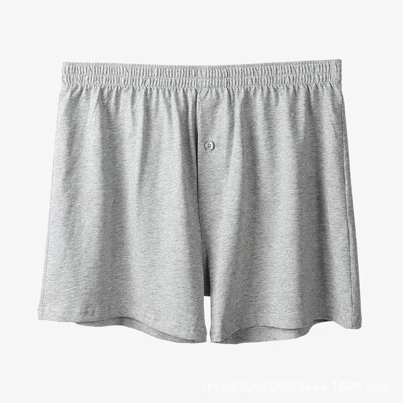 Men's high-waist loose fit cotton boxer shorts in black, shown flat.