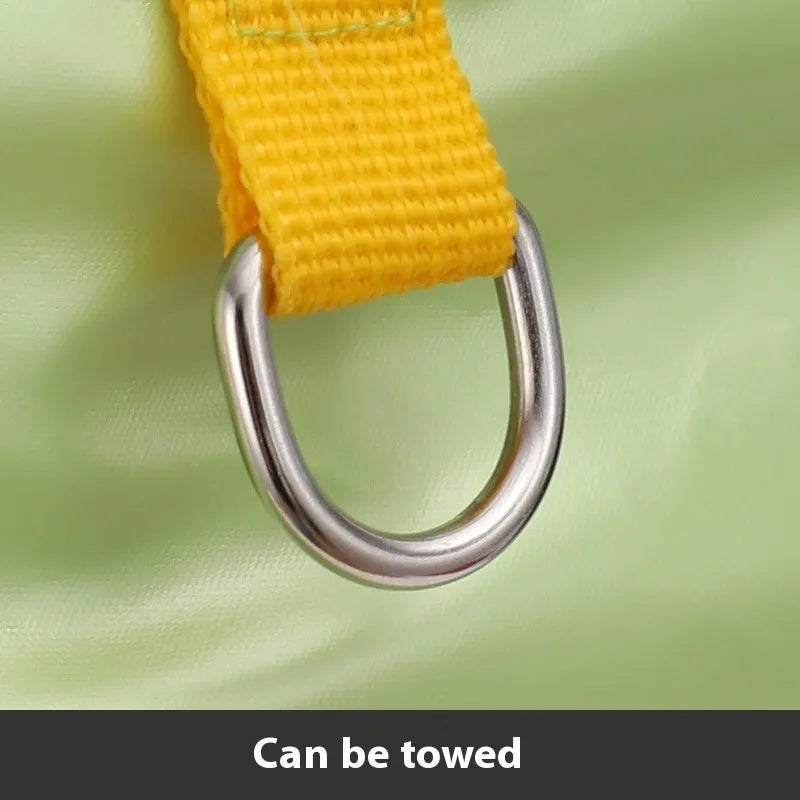 Green waterproof cotton dog coat with four-legged design on medium-sized dog