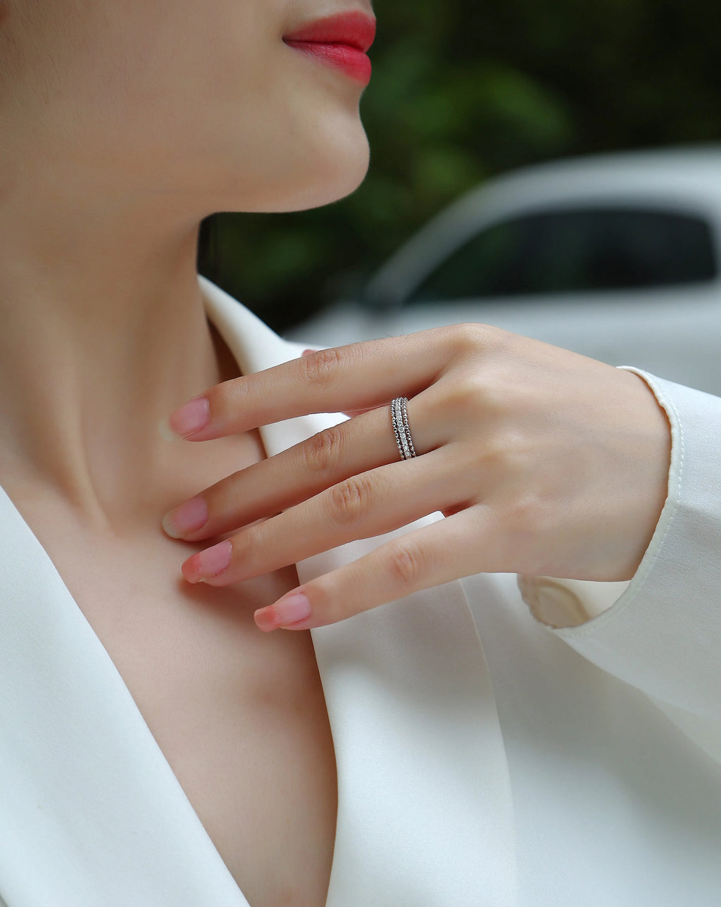 Moissanite wedding ring set in gold colour S925 silver with platinum plating on white background