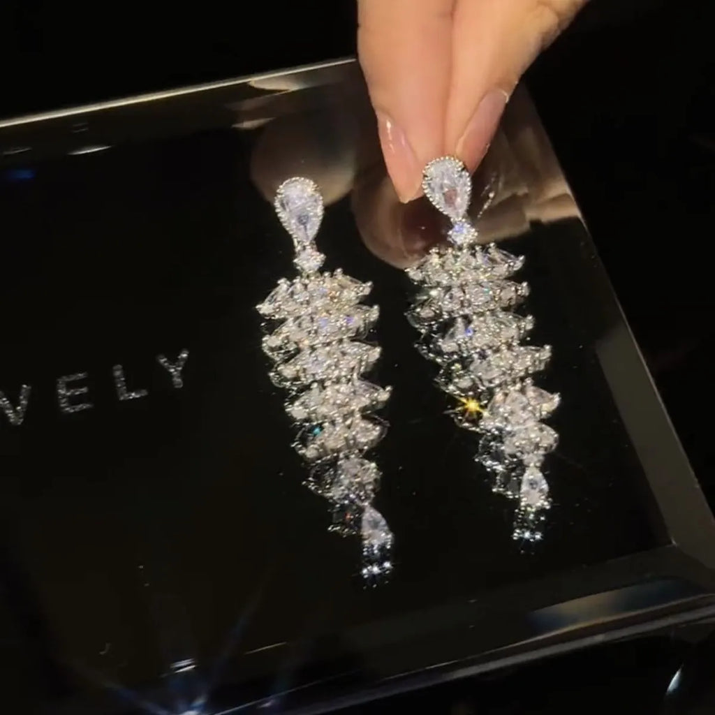 Silver pagoda Christmas tree drop earrings with sparkling zircon crystals on copper stud fittings