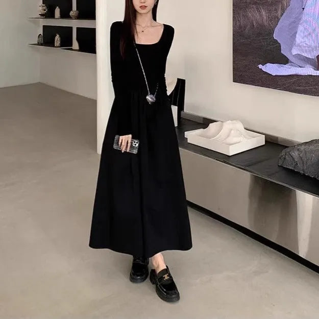 Women's black square collar A-line knitted dress with long sleeves and elastic waist.