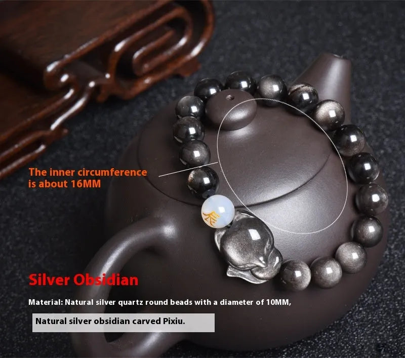 10mm obsidian zodiac bracelet on wrist showing adjustable cord closure and polished stone beads