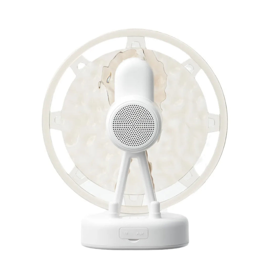 White or pink Bluetooth speaker with colourful LED atmosphere lighting effects.