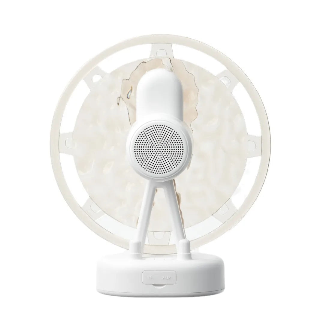White or pink Bluetooth speaker with colourful LED atmosphere lighting effects.