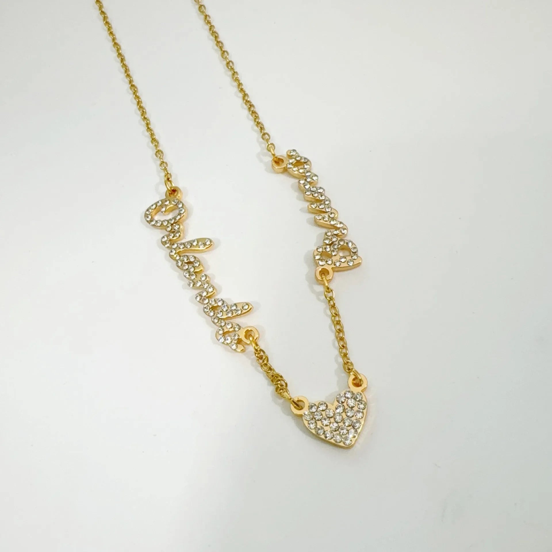 Customised diamond inlaid multi name necklace on stainless steel O-shaped chain, gold finish, with heart charms