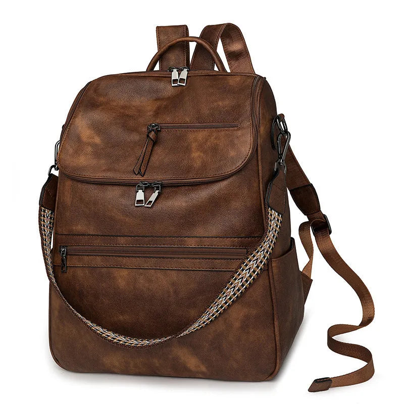 Retro college backpack with curved shoulder straps in six colour options including black, blue, and yellow apricot