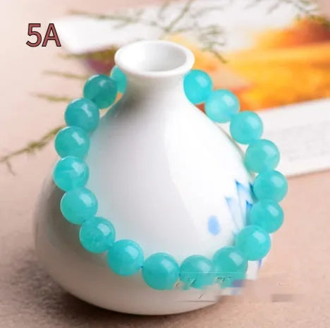 Grade 7A Amazonite natural stone bracelet with polished ice-colour beads on a black elastic cord.
