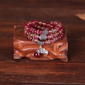 Handmade Chinese knot bracelet with natural watermelon crystal beads in traditional design