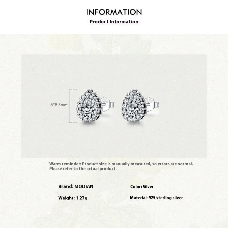 Women's silver water drop ear studs made from 925 sterling silver with diamond treatment