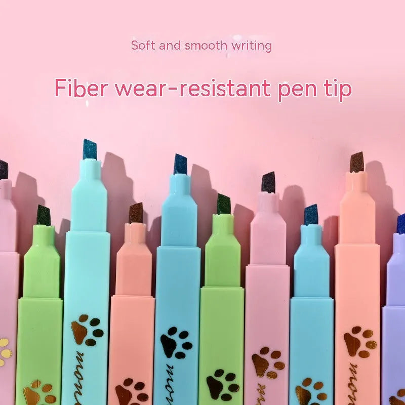 Box of six Cat's Paw fluorescent marking pens with oblique nibs, shown in assorted colours.