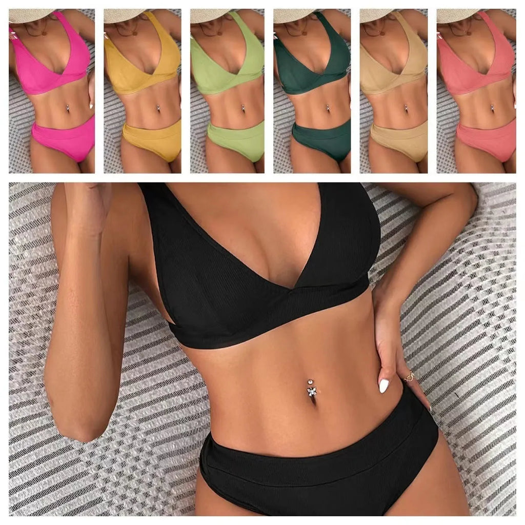 Women's black bikini with lace-up front and high-waisted split bottom.