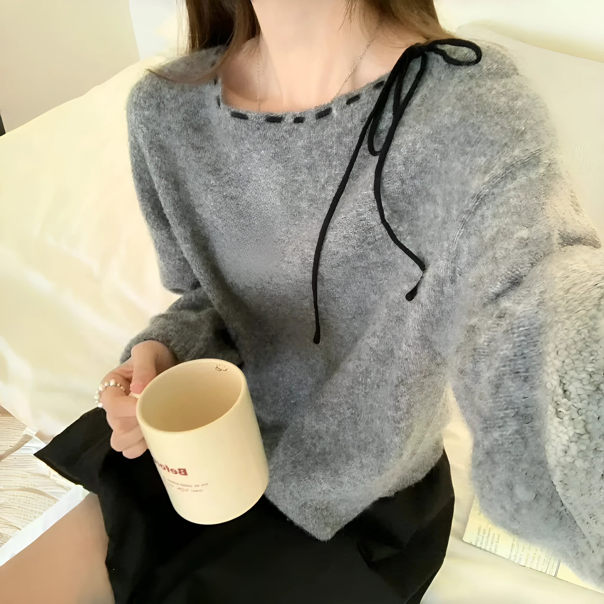 Women's loose-fitting black knitwear pullover jumper with regenerated cellulose fibre construction