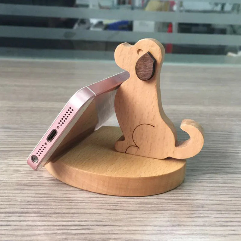 Creative resin animal topper on a beech wood lazy phone holder bracket on a desk