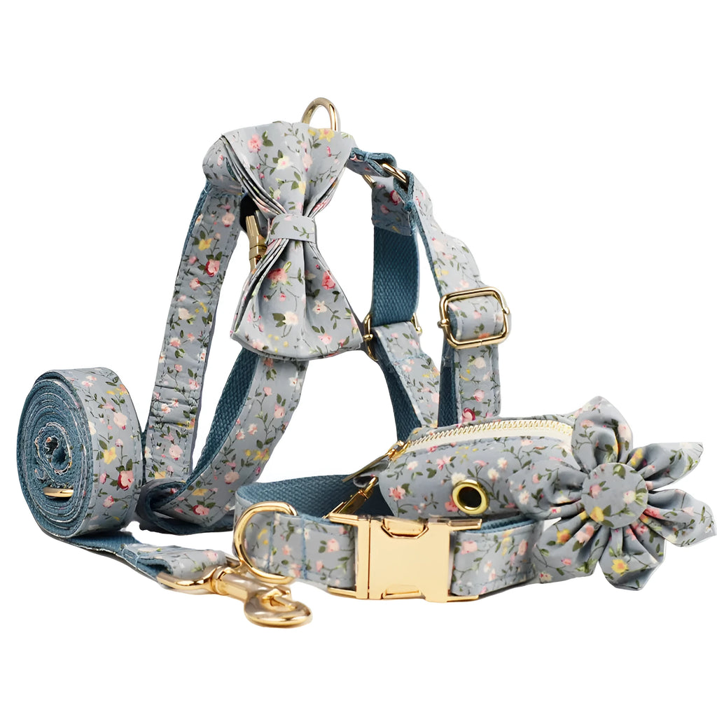 Floral dog collar set with matching leash, vest, and bow accessories in polyester cotton cloth
