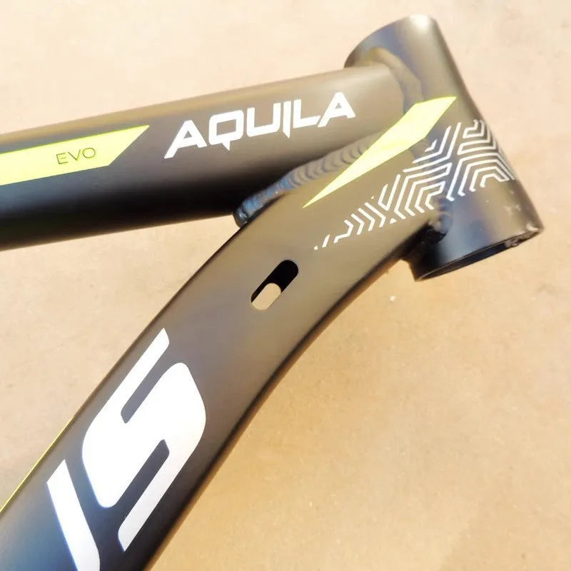 Black green aluminium 29-inch mountain bike frame showing disc brake mount and inner cable ports.