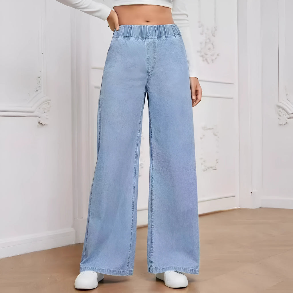 Light blue washed wide-leg straight cut jeans with mid-waist fit and zip fly opening