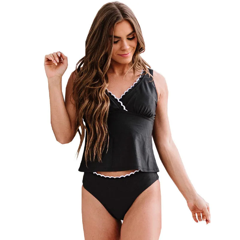 Black women's nylon bikini swimsuit set with sleeveless design on size chart