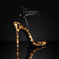 Women's leopard print Roman sandals with pointed toe and lace-up fastening on rubber sole