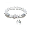 Handcrafted couple bracelet in natural black agate and opal grey with 10mm wave-shaped beads