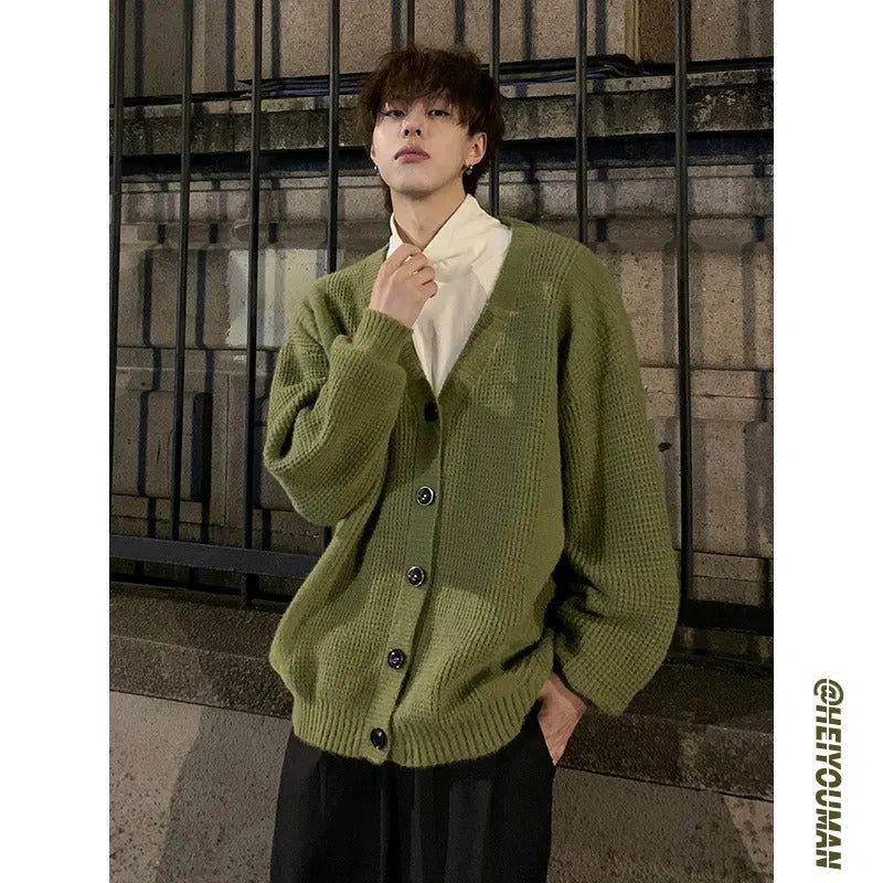 Men's loose-fit cotton blend cardigan sweater with V-neck collar and long sleeves in solid colour