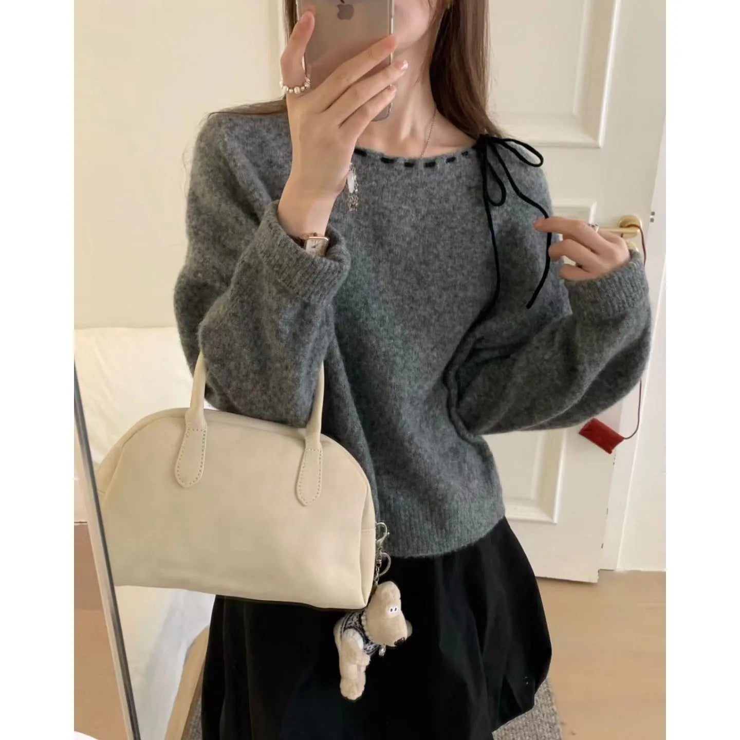 Women's loose-fitting black knitwear pullover jumper with regenerated cellulose fibre construction