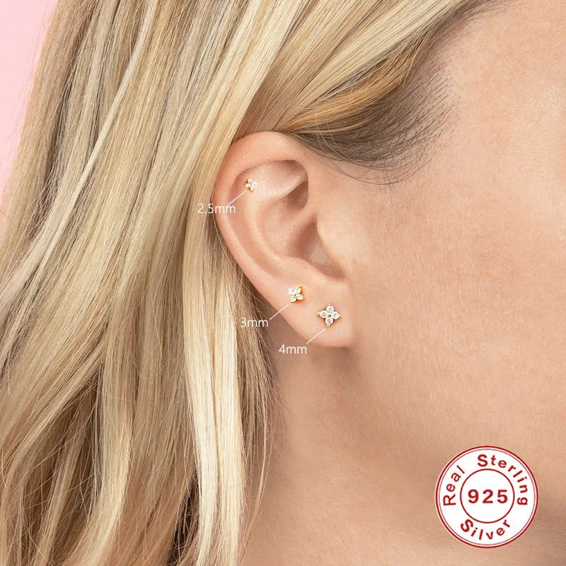 Geometric petal crystal flowers stud earrings in sterling silver with gold or platinum finish.