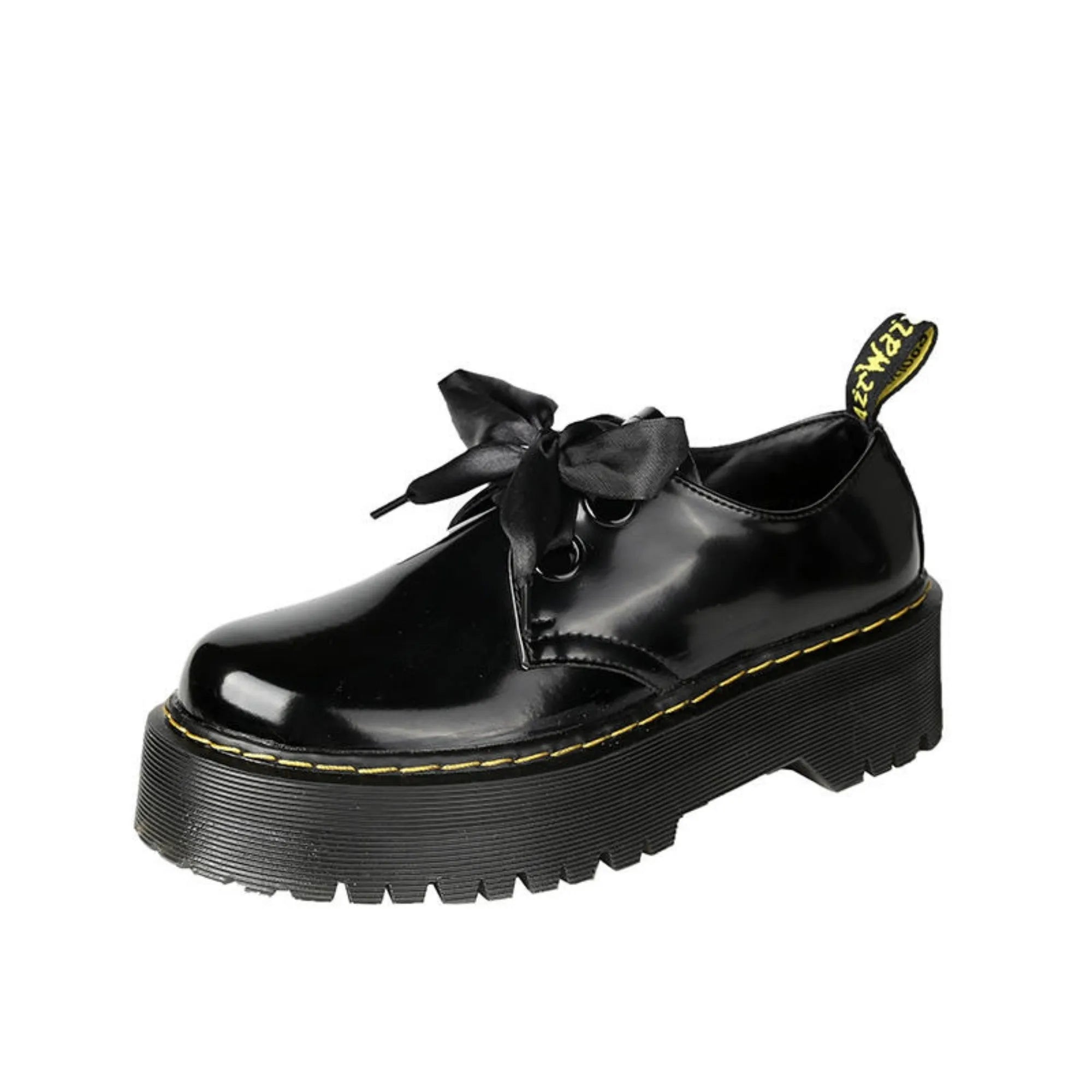 Women's black thick-soled leather-style lace-up shoes with ribbon and cross strap details on a white background.