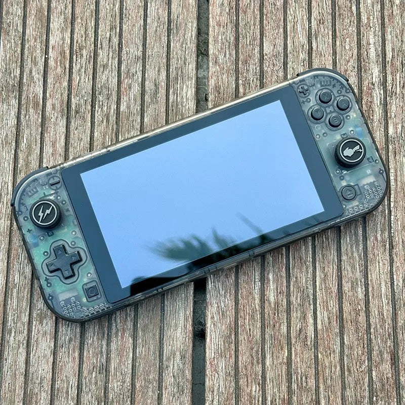 DIY transparent Switch Lite shell kit with ABS PC material, tempered film, and button set on a neutral background