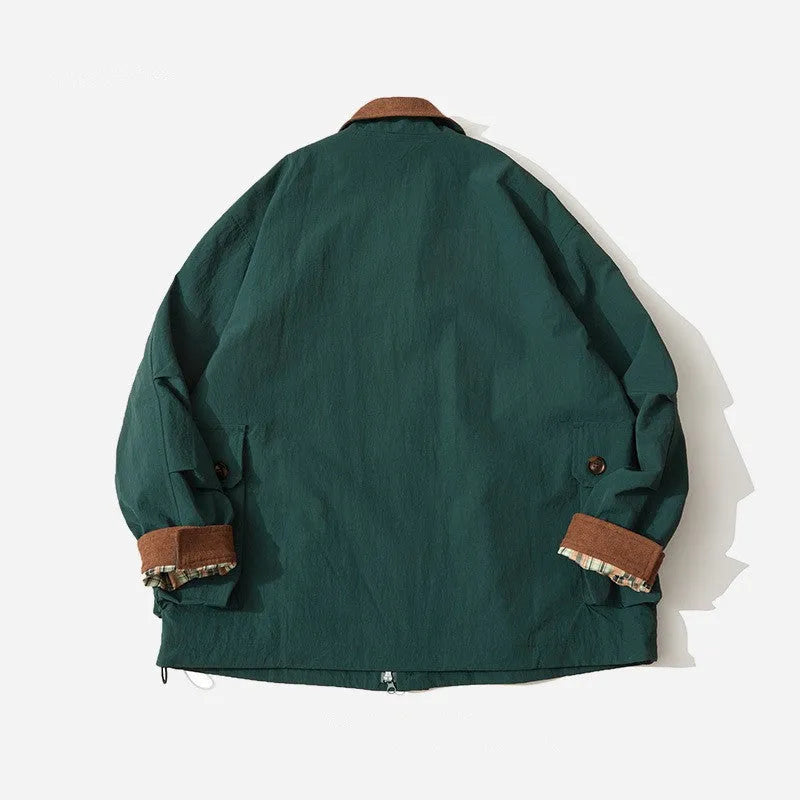 Green casual polyester jacket with long sleeves and side seam pockets on a hanger.