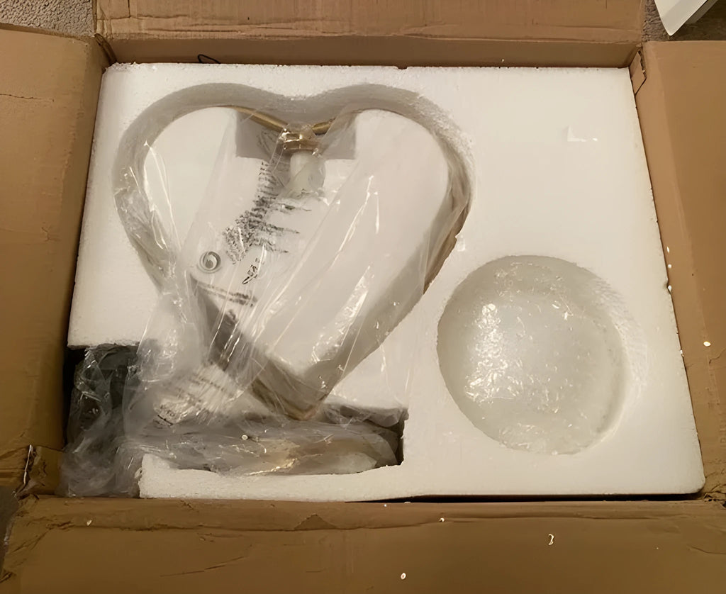 Heart shaped decorative LED lamp with warm white light on a table