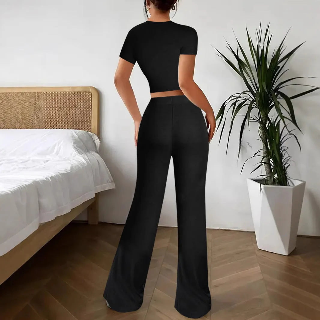 Black polyester trouser suit set with high-waisted trousers and short sleeve V-neck top