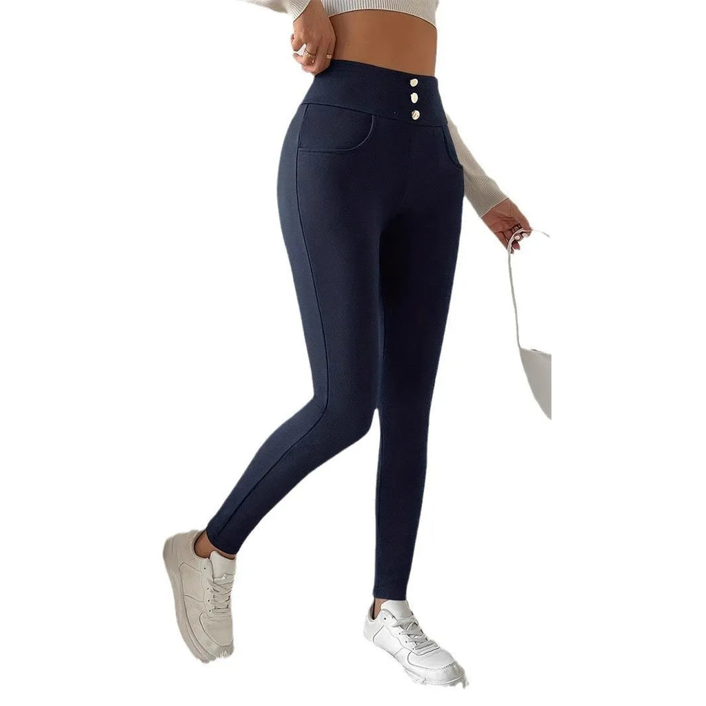 Navy blue women's trousers with high waist and straight leg design on hanger