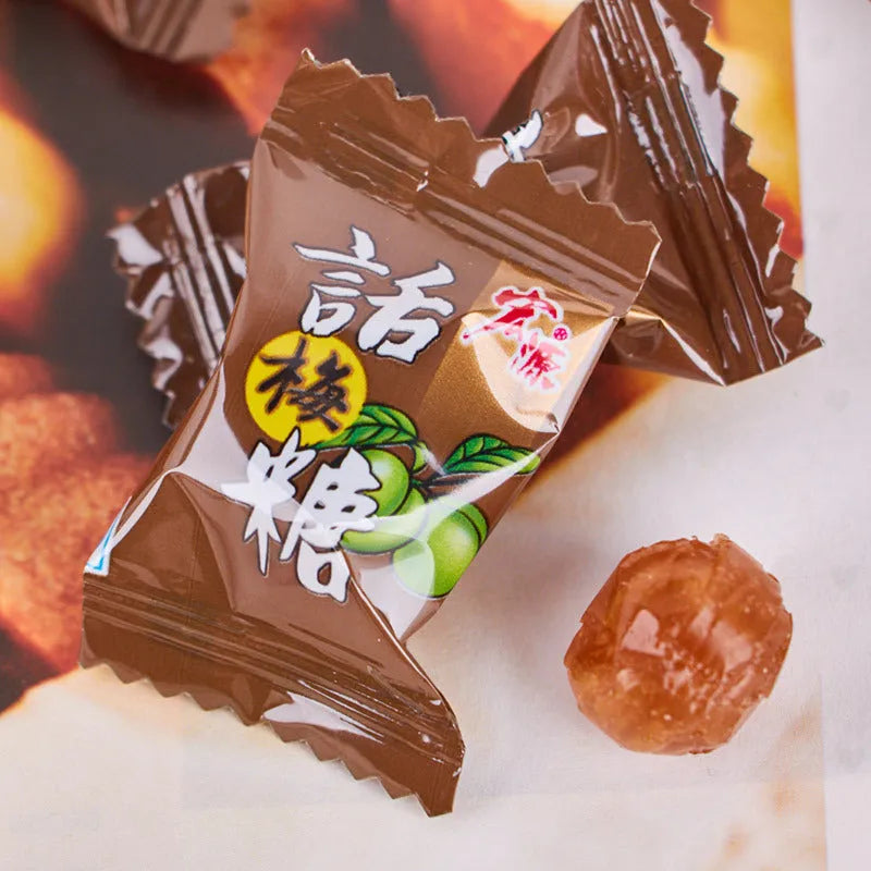 Bag of assorted hard candies: plum sugar, guava fruit flavour, and tangerine peel sweets.