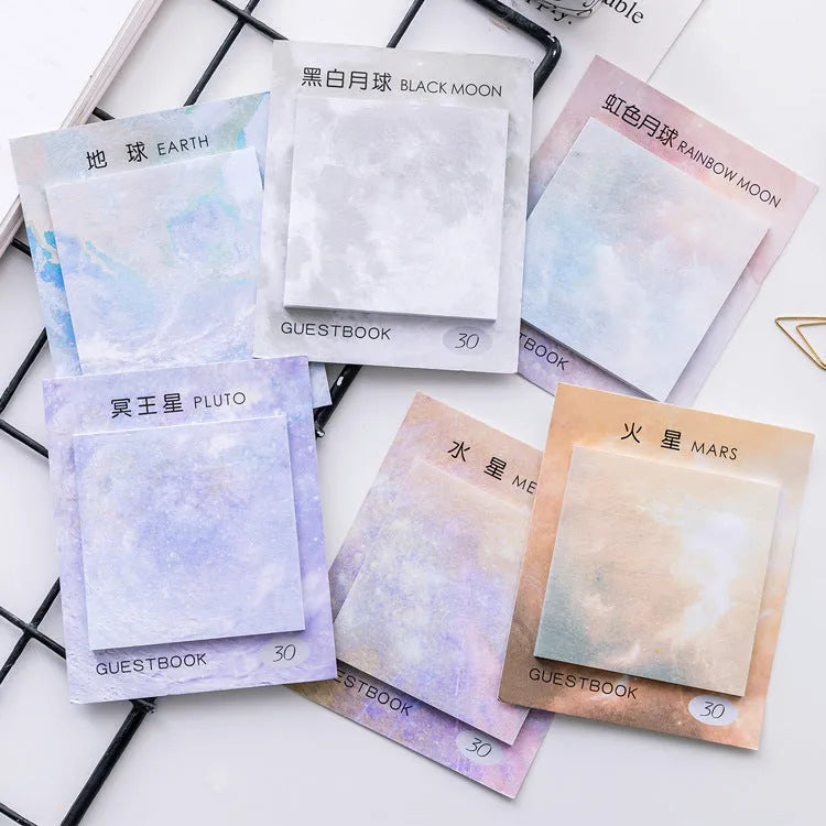 Square planet sticky notes notepad showing astronomical oil painting designs including various planetary imagery