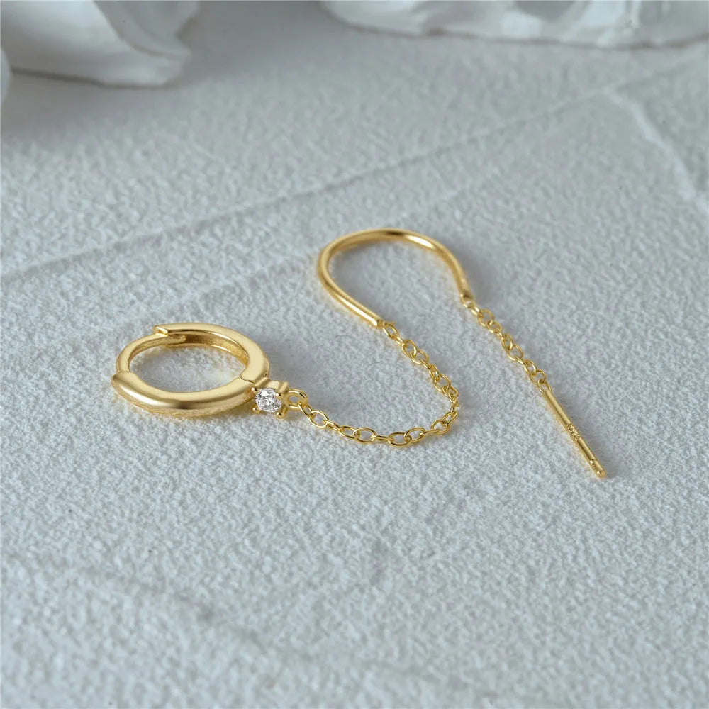 S925 sterling silver geometric ear studs with diamond flower, tassel, and chain design in electroplated gold.