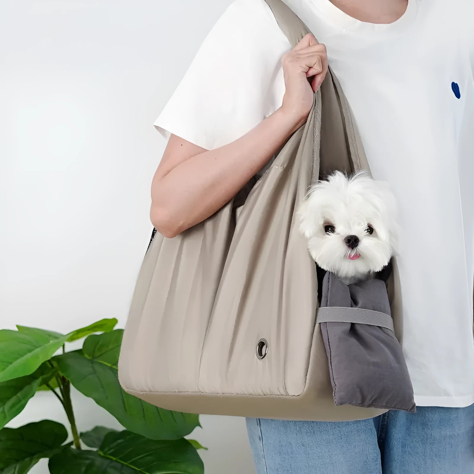Apricot-colour cloth pet carrier handbag for small pets, showing single handle and rectangular shape.