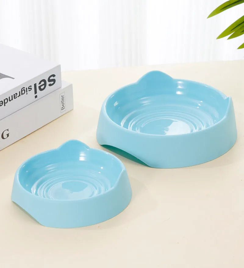 Blue ceramic dog slow feeder bowl with maze pattern for slowing down fast-eating dogs.
