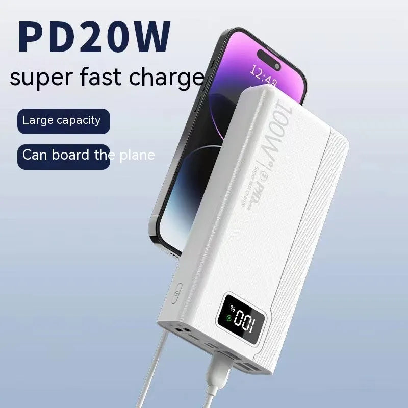 Large capacity power bank in black or white plastic casing with dimensions 150mm x 76mm