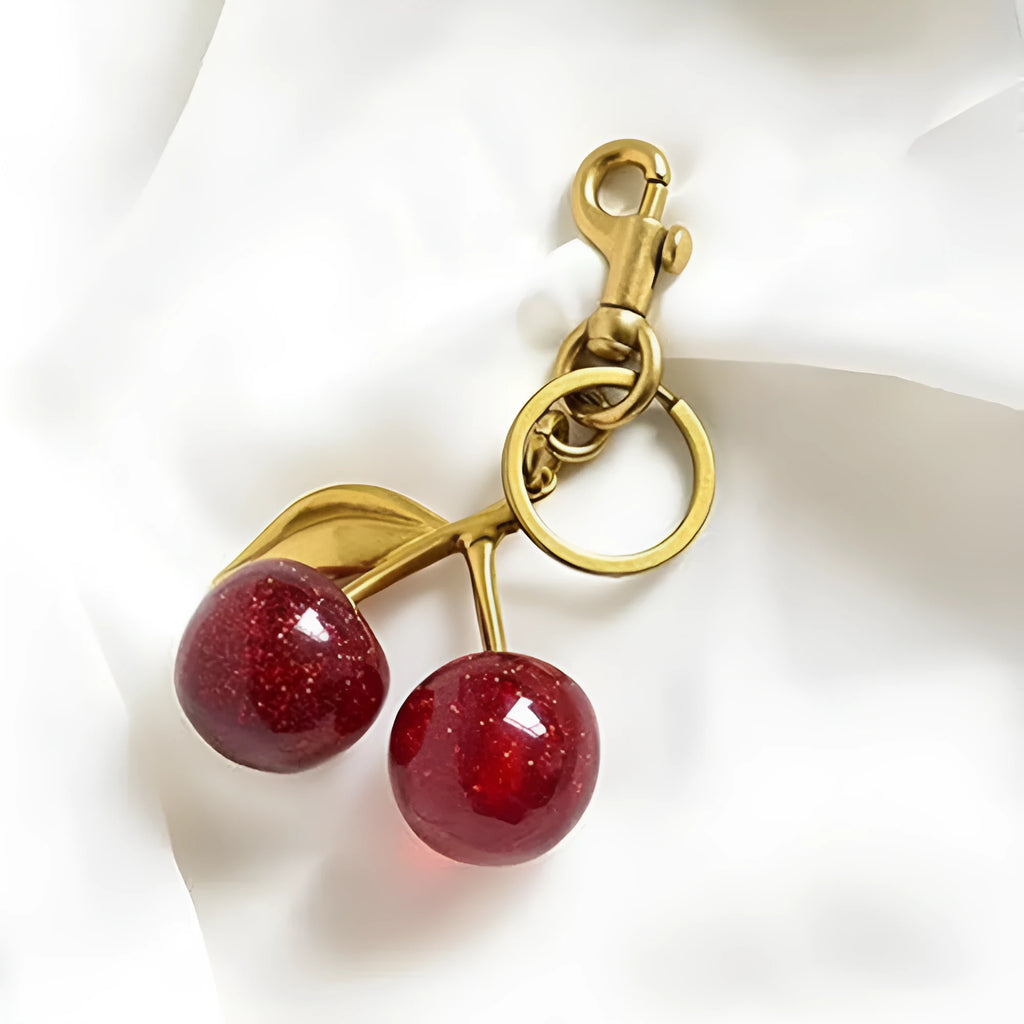 Zinc alloy cherry-shaped keychain pendant in red or pink colour