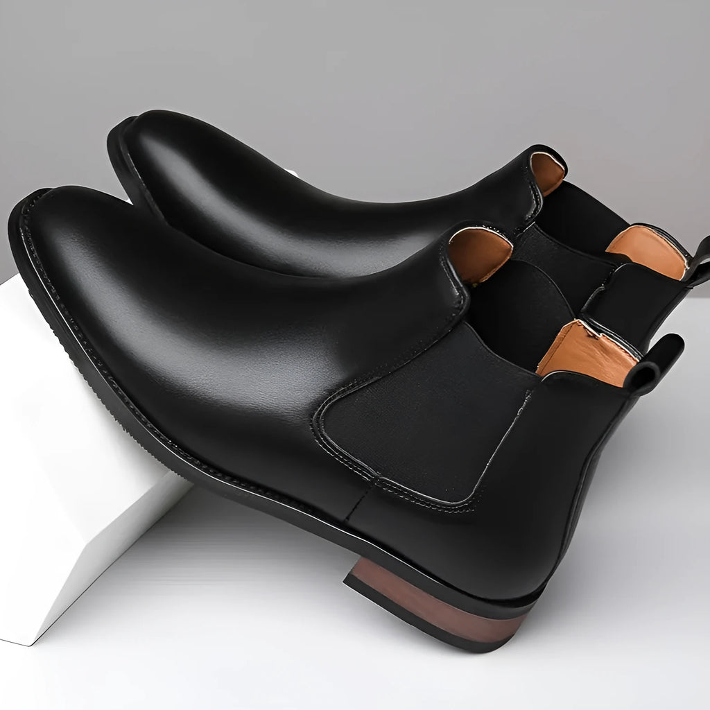 Men's black Chelsea high-top boots with pointed toe, artificial PU upper, and rubber sole