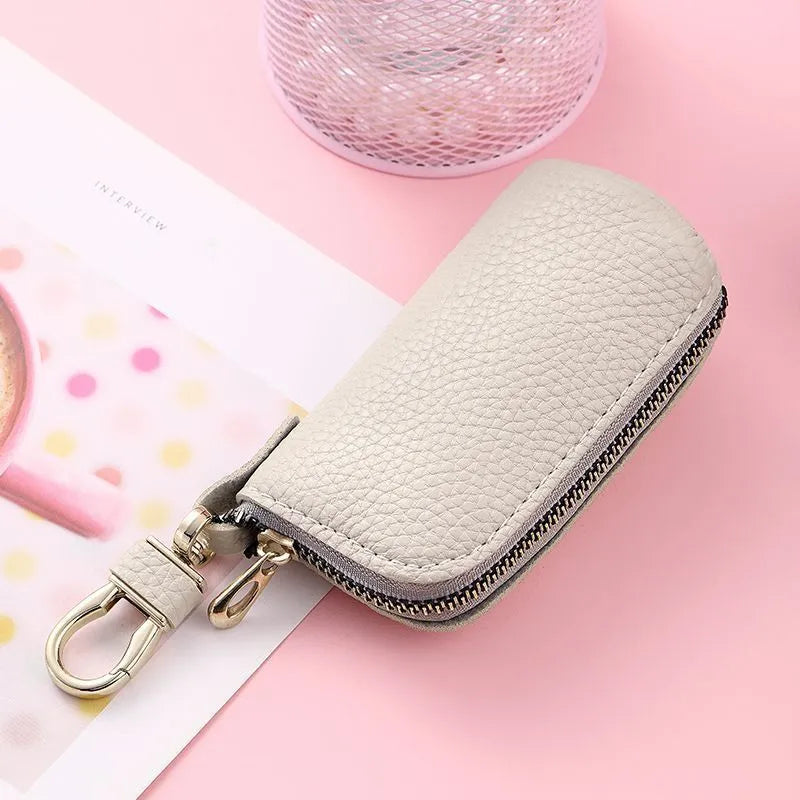 Men's PU key case organiser with zipper closure in black, grey, or pink colours