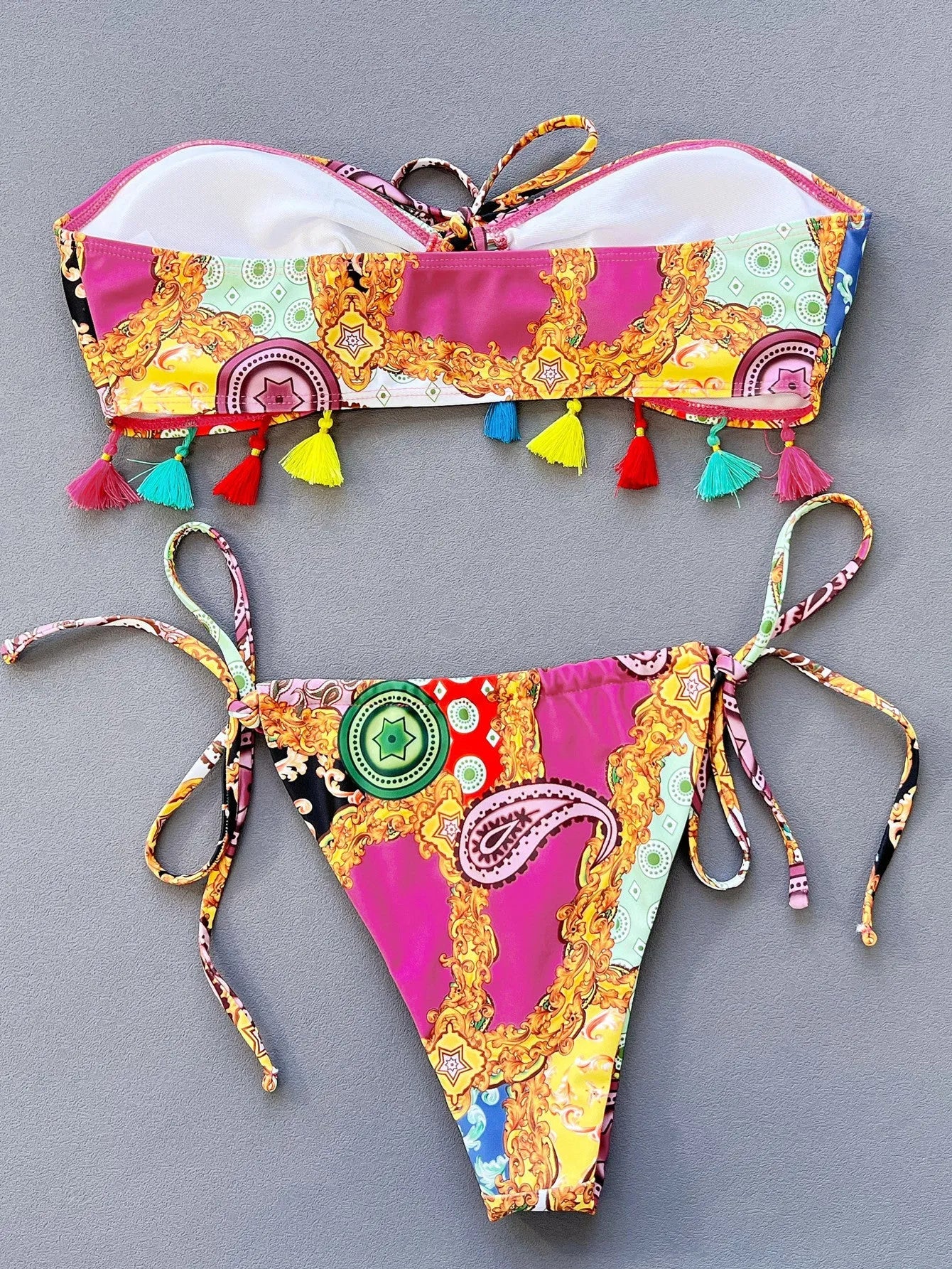 Women's printed separated swimwear bikini set with tube top and briefs on a mannequin