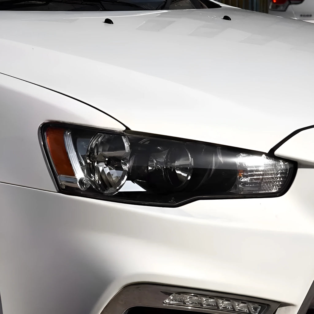 Transparent plastic headlight housing cover measuring 50mm by 30mm by 20mm