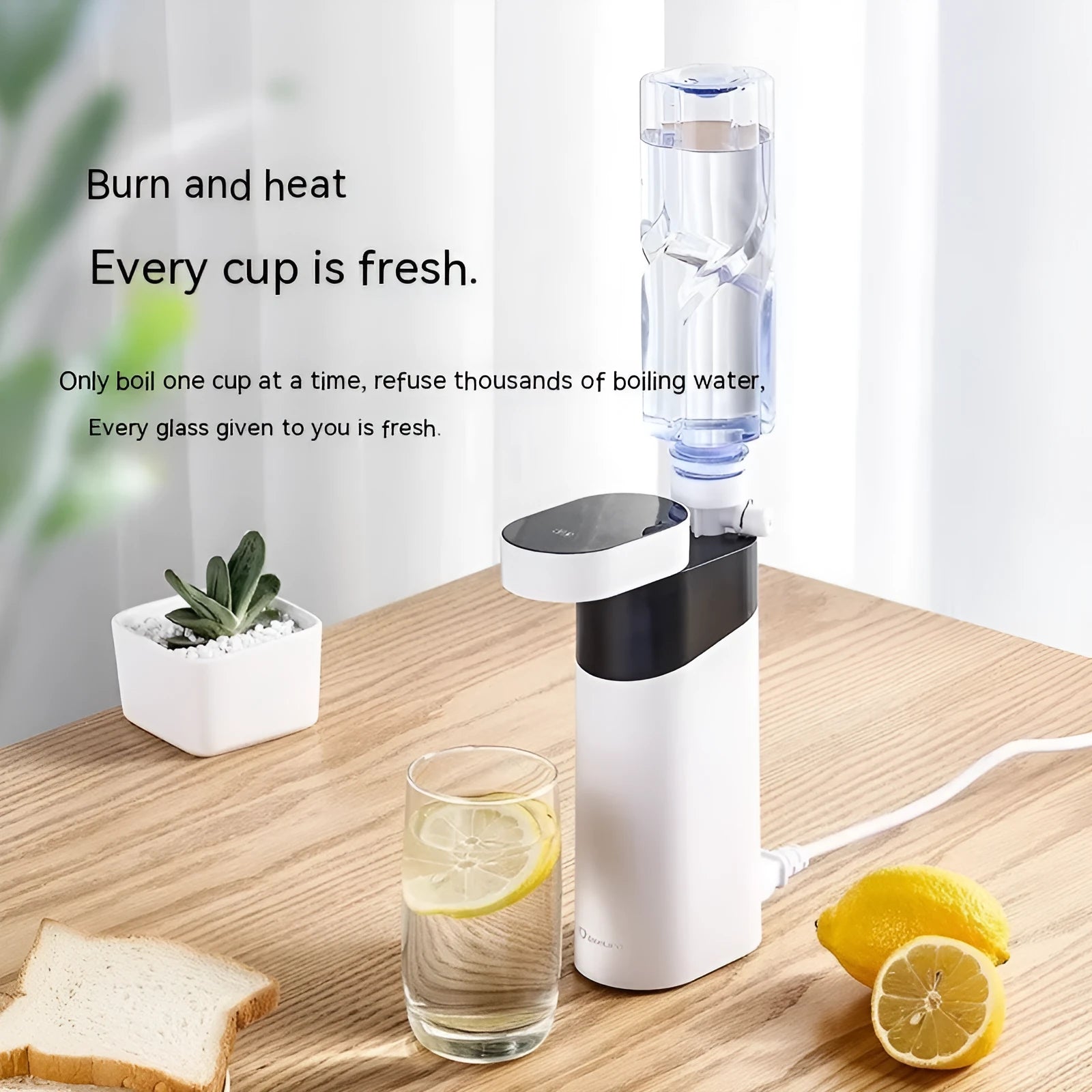Compact black instant water dispenser with digital temperature display and water tank