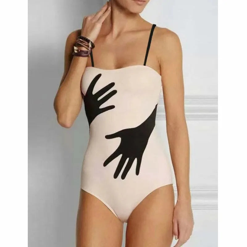 Women's one-piece bikini swimsuit with a gauze skirt attached, shown on a model.