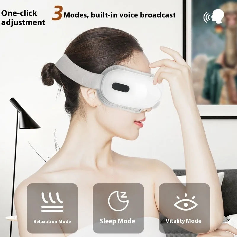 White rechargeable eye massager for hot compress and airbag massage relief